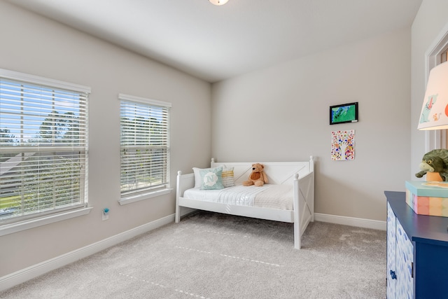 168 Secret St, Freeport, FL 32439 - bedroom with baseboards and light carpet
