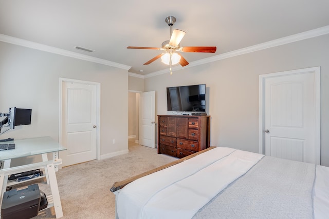 carpeted bedroom featuring ceiling fan and crown molding