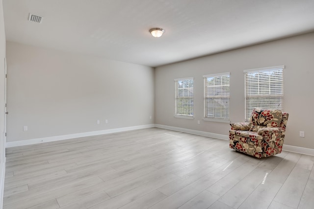 unfurnished room featuring light hardwood / wood-style flooring