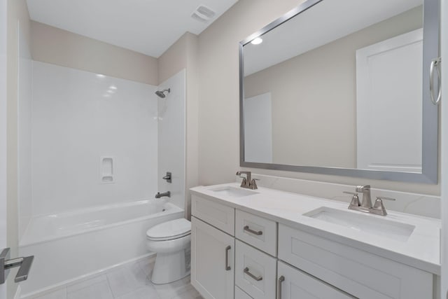 full bathroom with tile patterned floors, vanity, shower / bath combination, and toilet