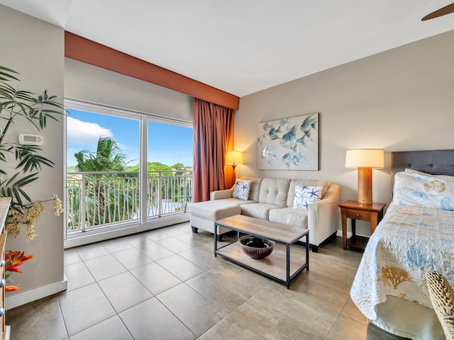 bedroom featuring light tile patterned flooring and access to outside