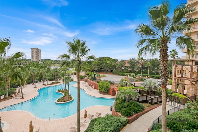 view of swimming pool featuring a patio area