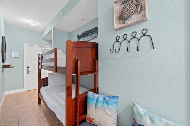 bedroom with tile floors