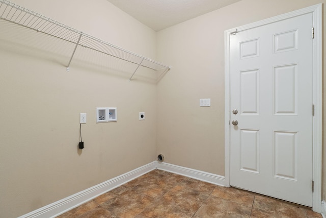 clothes washing area with washer hookup and hookup for an electric dryer