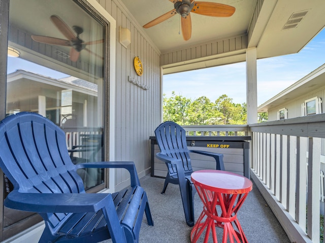 balcony featuring ceiling fan