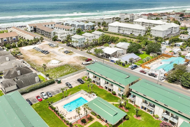 aerial view featuring a beach view and a water view