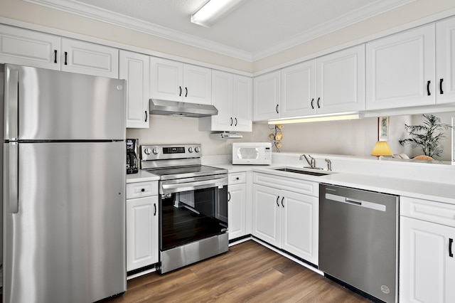 kitchen featuring crown molding, sink, white cabinets, and appliances with stainless steel finishes