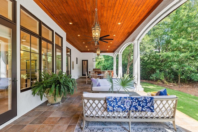 view of patio / terrace with a ceiling fan, outdoor dining area, and an outdoor living space