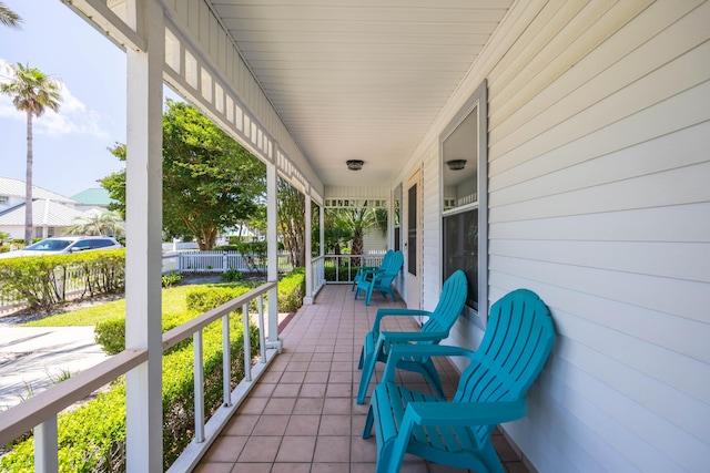 view of patio featuring a porch