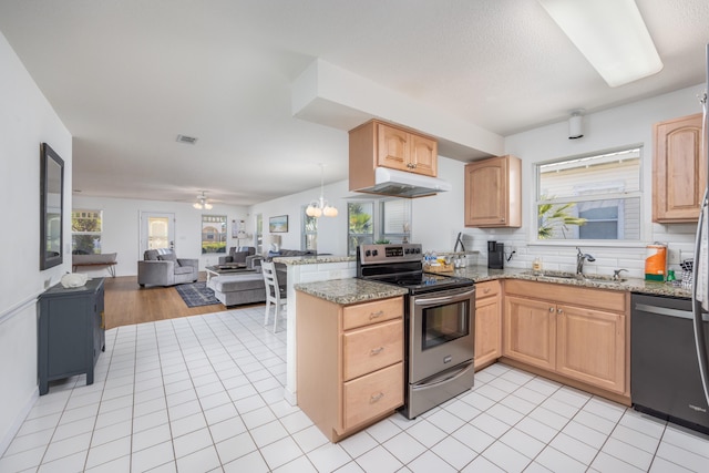 kitchen with stainless steel appliances, sink, light brown cabinets, and light tile patterned floors