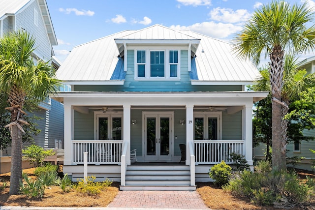 view of front of house featuring french doors and covered porch