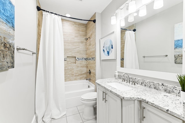 full bathroom featuring vanity, tile patterned floors, shower / bath combination with curtain, and toilet