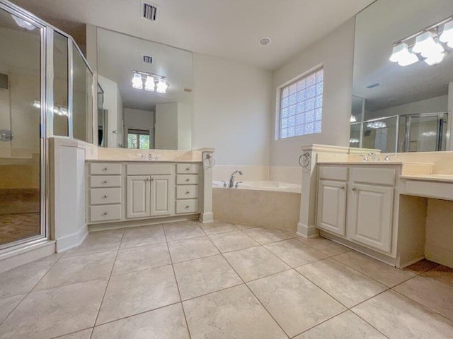 bathroom featuring tile patterned floors, vanity, and plus walk in shower