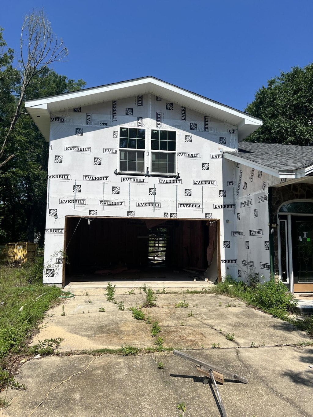 exterior space featuring concrete driveway