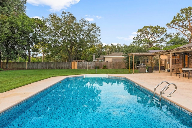 view of swimming pool with a pergola, a patio, and a yard