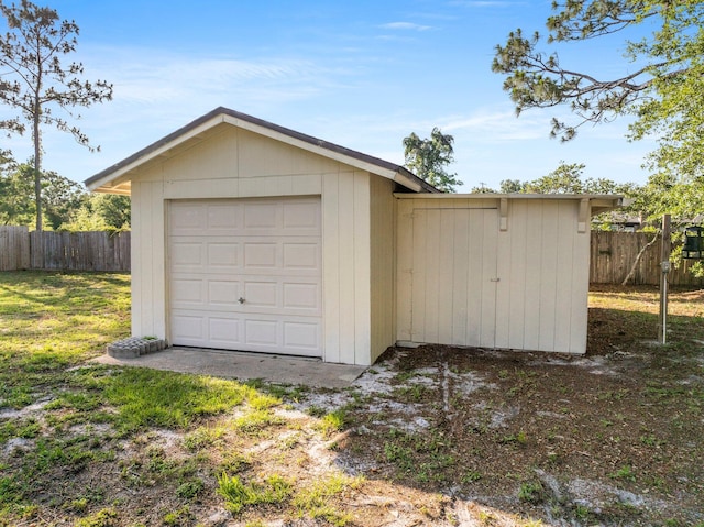 garage with a yard