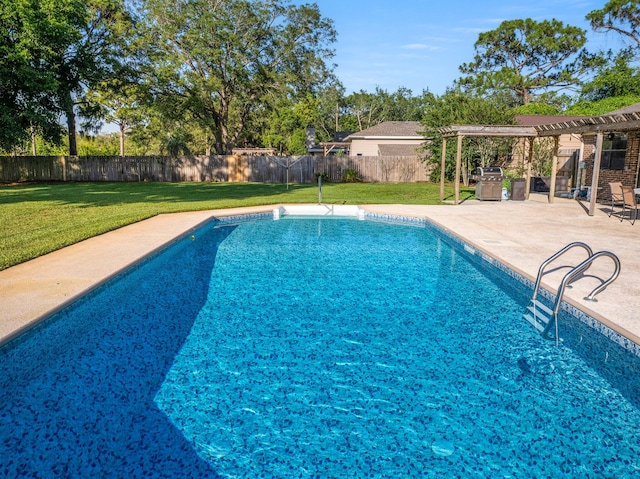 view of pool with a pergola, a patio area, and a yard