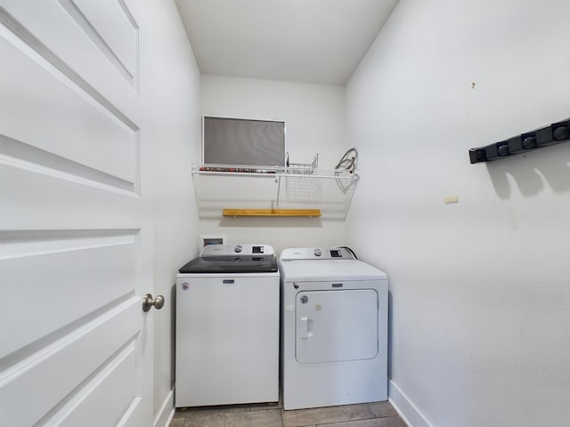 laundry room featuring washing machine and clothes dryer