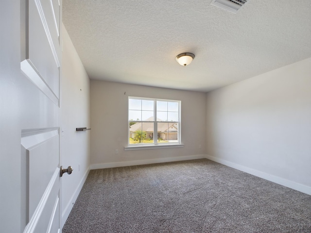 spare room with carpet floors