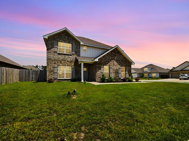 front of property with a lawn