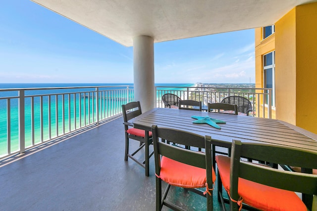 balcony featuring a water view