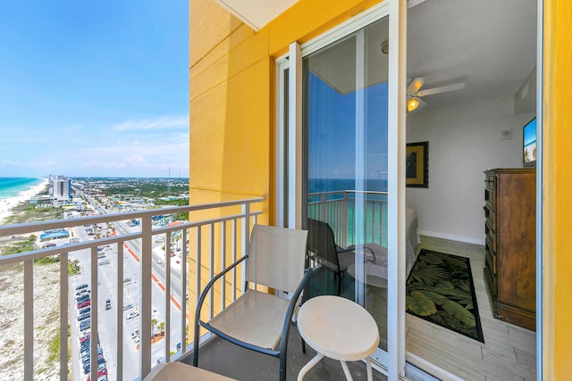 balcony featuring a water view