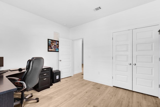 office space featuring light hardwood / wood-style floors