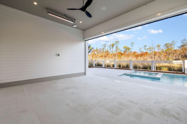 view of swimming pool featuring ceiling fan, an in ground hot tub, and a patio