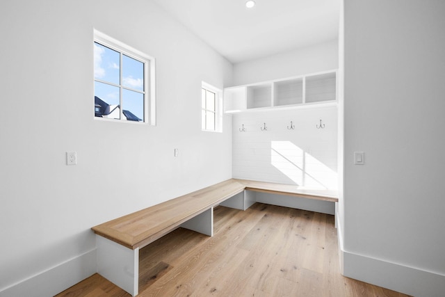 mudroom with light hardwood / wood-style flooring