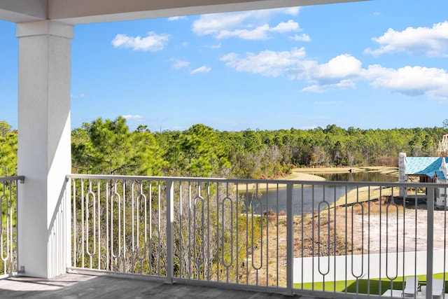 balcony featuring a water view