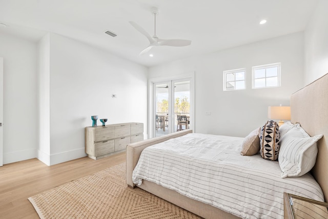 bedroom with baseboards, visible vents, wood finished floors, and recessed lighting