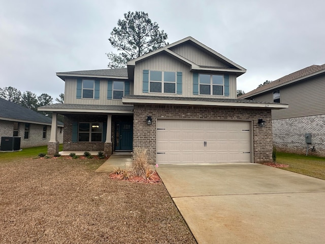 craftsman-style house featuring central AC and a garage