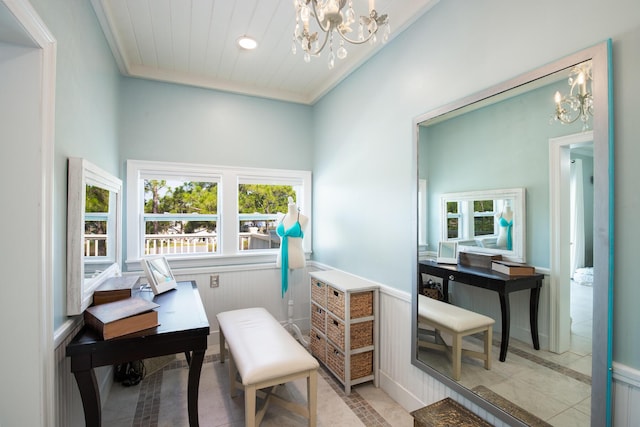 tiled home office featuring a notable chandelier