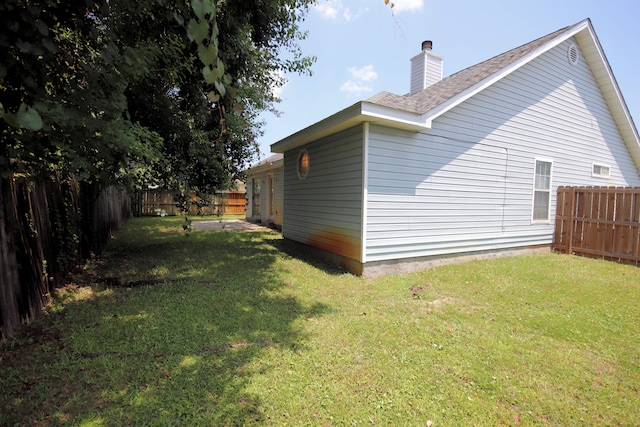 exterior space with a lawn