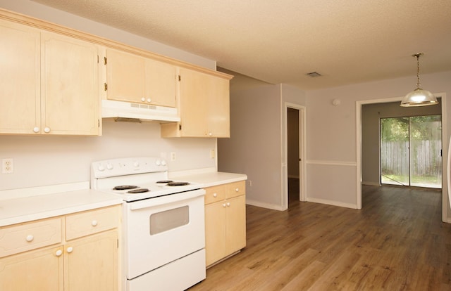 kitchen with hanging light fixtures, hardwood / wood-style flooring, white electric range oven, and a textured ceiling