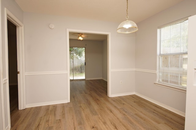 empty room featuring hardwood / wood-style flooring