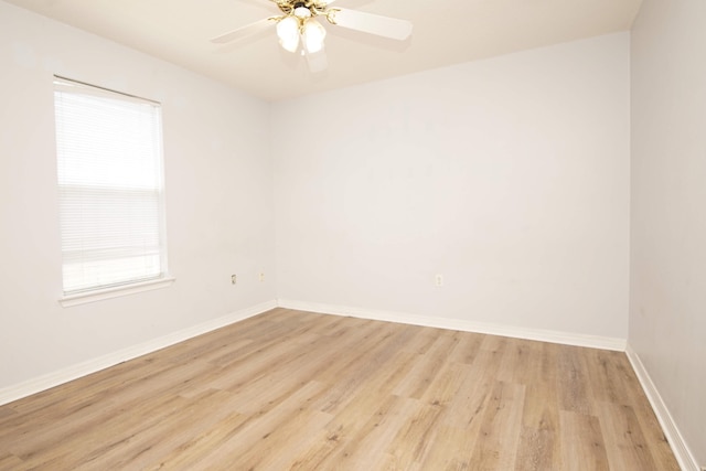 unfurnished room featuring light hardwood / wood-style flooring and ceiling fan