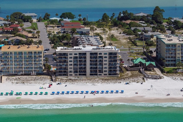 aerial view featuring a water view and a view of the beach