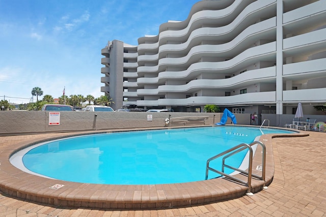 view of pool with a patio area