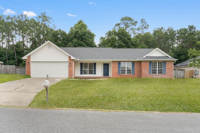 single story home with a garage and a front lawn