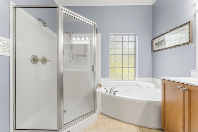 bathroom featuring separate shower and tub, tile patterned floors, and vanity