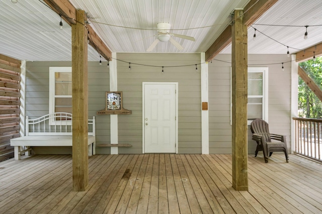 exterior space featuring ceiling fan