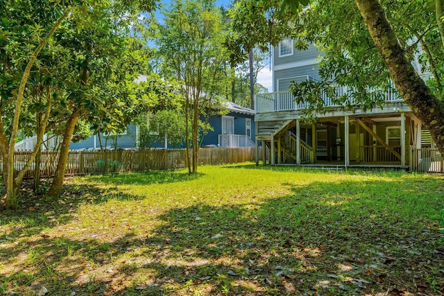 view of yard with a wooden deck