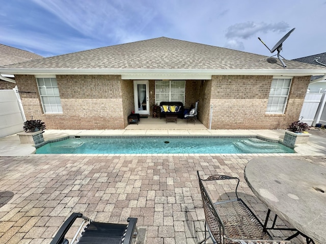 view of swimming pool featuring a patio