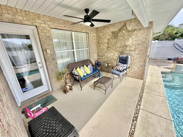 view of patio with ceiling fan and outdoor lounge area