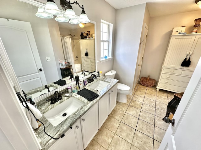 bathroom featuring toilet, tile patterned flooring, walk in shower, and vanity