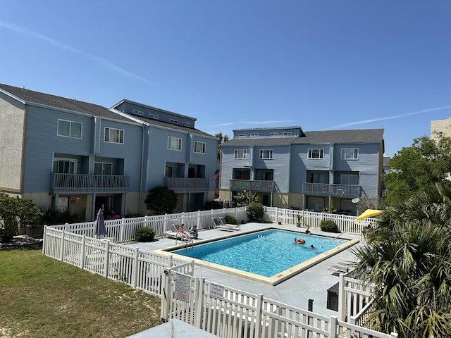 view of swimming pool with a patio