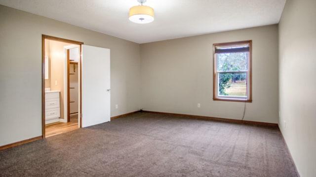 unfurnished room featuring carpet floors