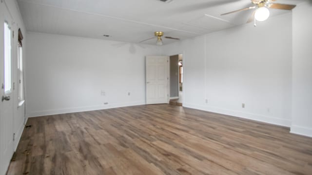 spare room with wood-type flooring