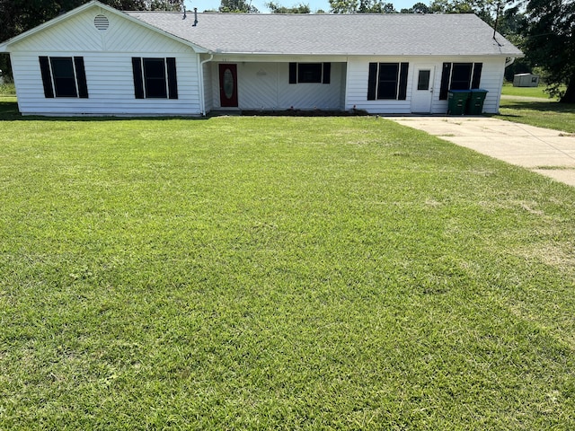 ranch-style house with a front yard